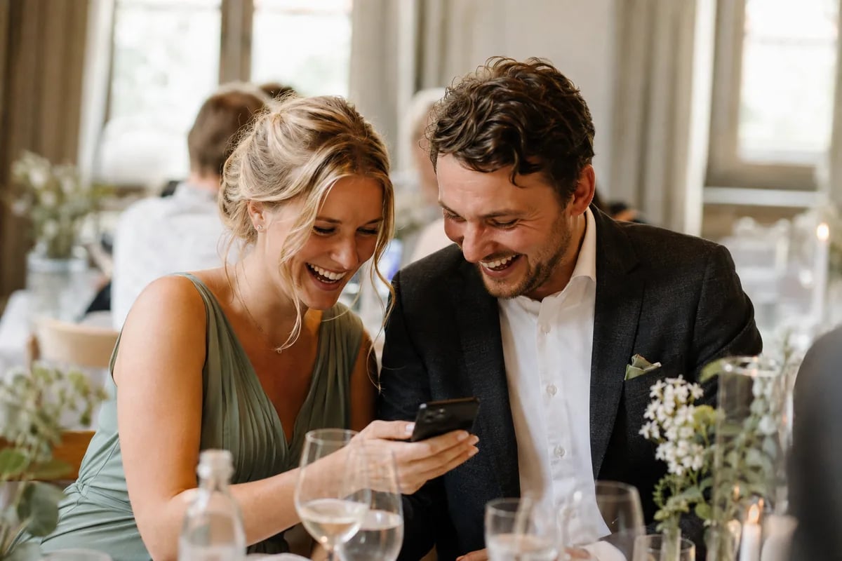 Collecting memories together at a wedding — image 2